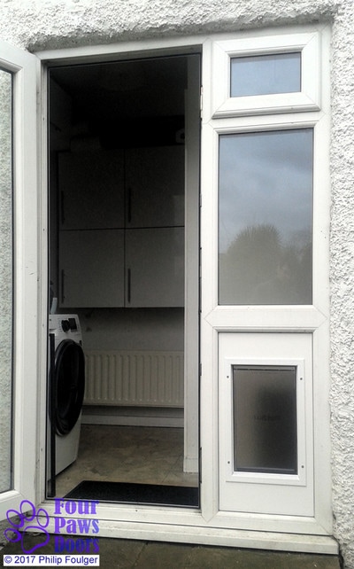 Staywell large aluminium dog door 640 in uPVC panel in place of double glazing