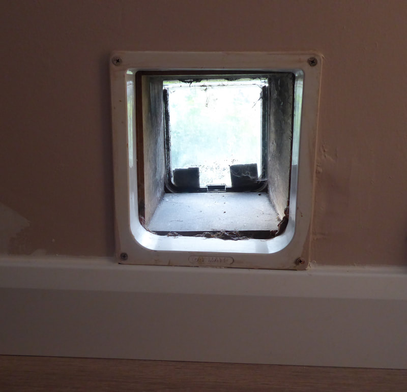 CatMate cat flap poorly fitted in wall