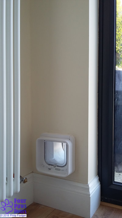 SureFlap microchip Cat Flap Connect in tight corner of wall
