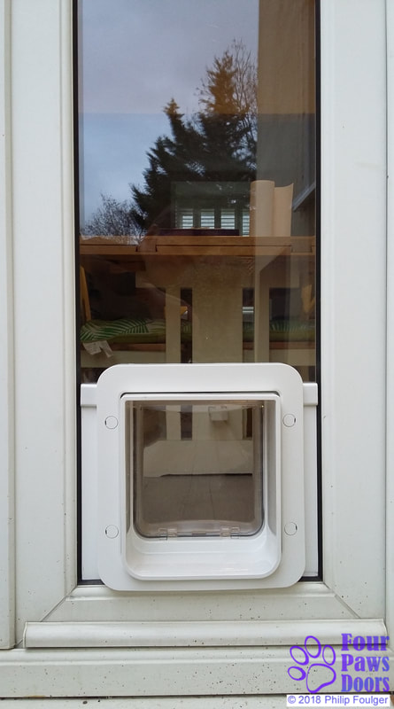 SureFlap Pet Door in narrow double glazed door